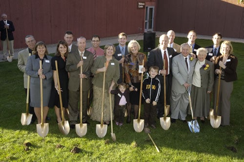 Dale Howard Ford Inc family holding shovel in backyard